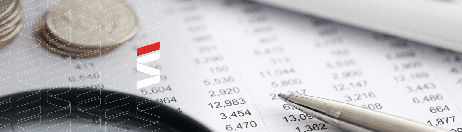 Balance sheet with magnifying glass and coins. Fraser Stryker logo icon repeating on the left side of the photo.
