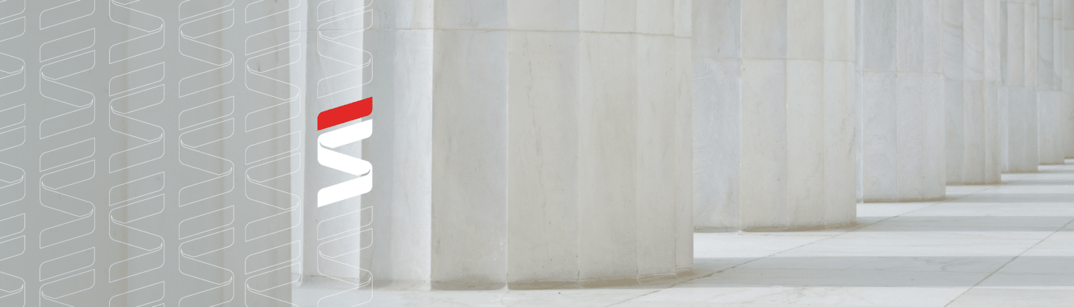 Marble columns in a government or courthouse building. Fraser Stryker logo icon in repeated patterns on the left side of the image.