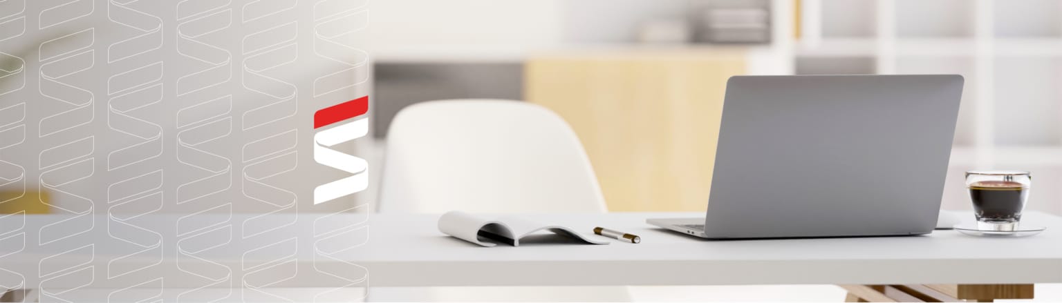 Photo of desk with computer, coffee, pen and notepad. Fraser Stryker logo icon repeating on the left side of the photo.