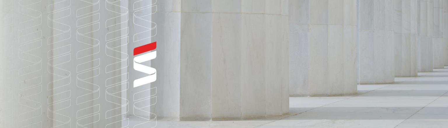 Marble columns in a government or courthouse building. Fraser Stryker logo icon in repeated patterns on the left side of the image.