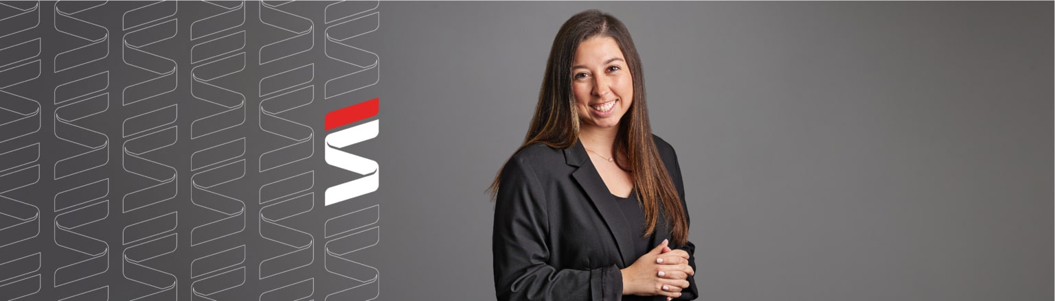Photo of Isabella Washka, wearing a black shirt and a black jacket.