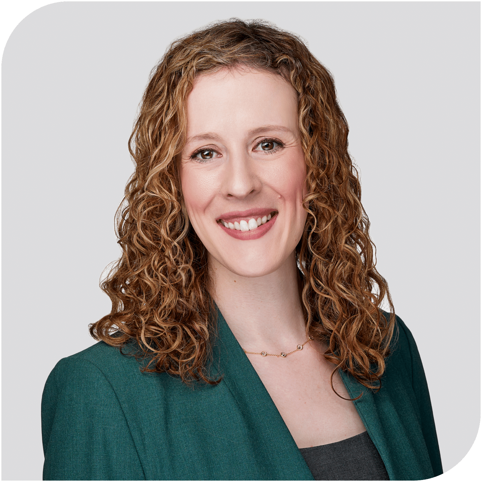 Sarah Dempsey, Fraser Stryker attorney, wearing a green suit jacket with a black shirt.