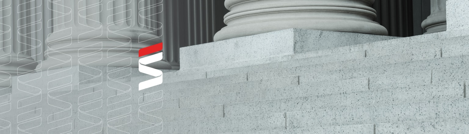 View of classical stone columns with grey stone steps. Fraser Stryker logo pattern on the left side.