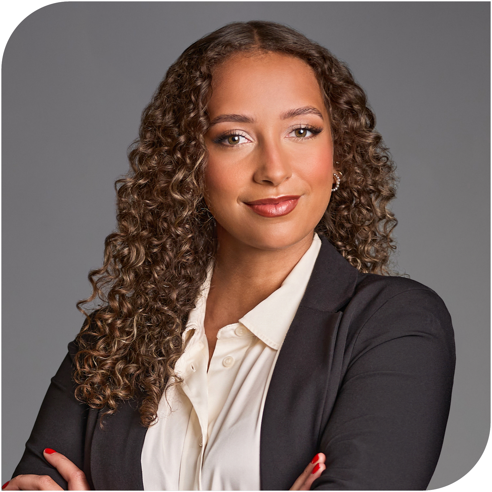 Abigail Bergstrom, Fraser Stryker Summer Associate, wearing a black jacket and a ivory button down shirt