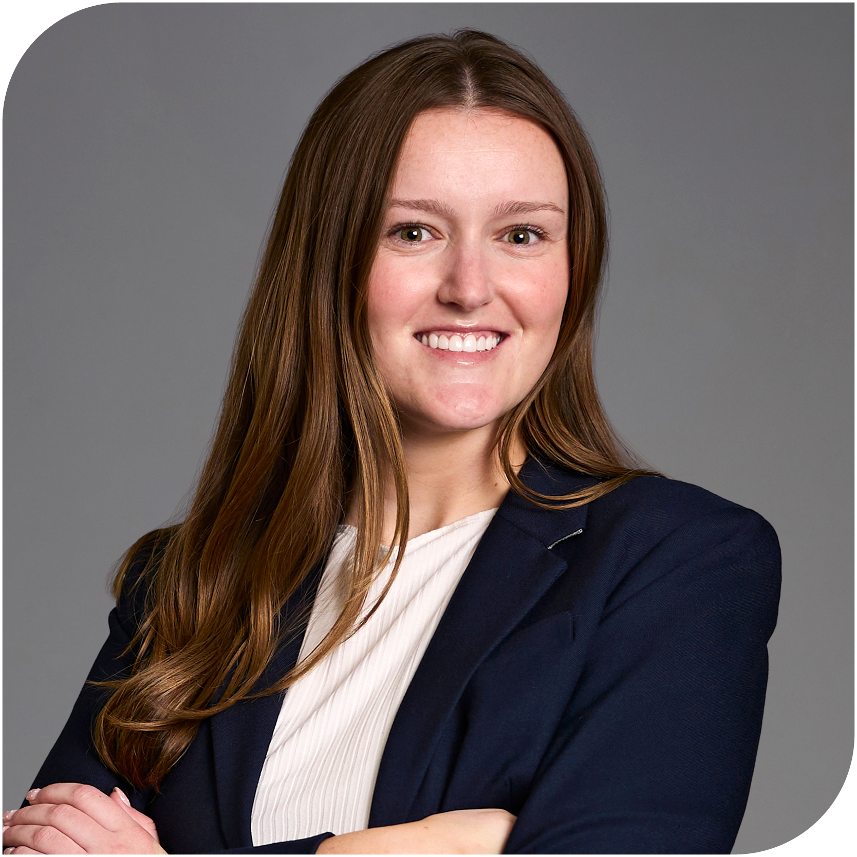Ellen Rogers, Fraser Stryker Summer Associate, wearing a black jacket and a ivory shirt