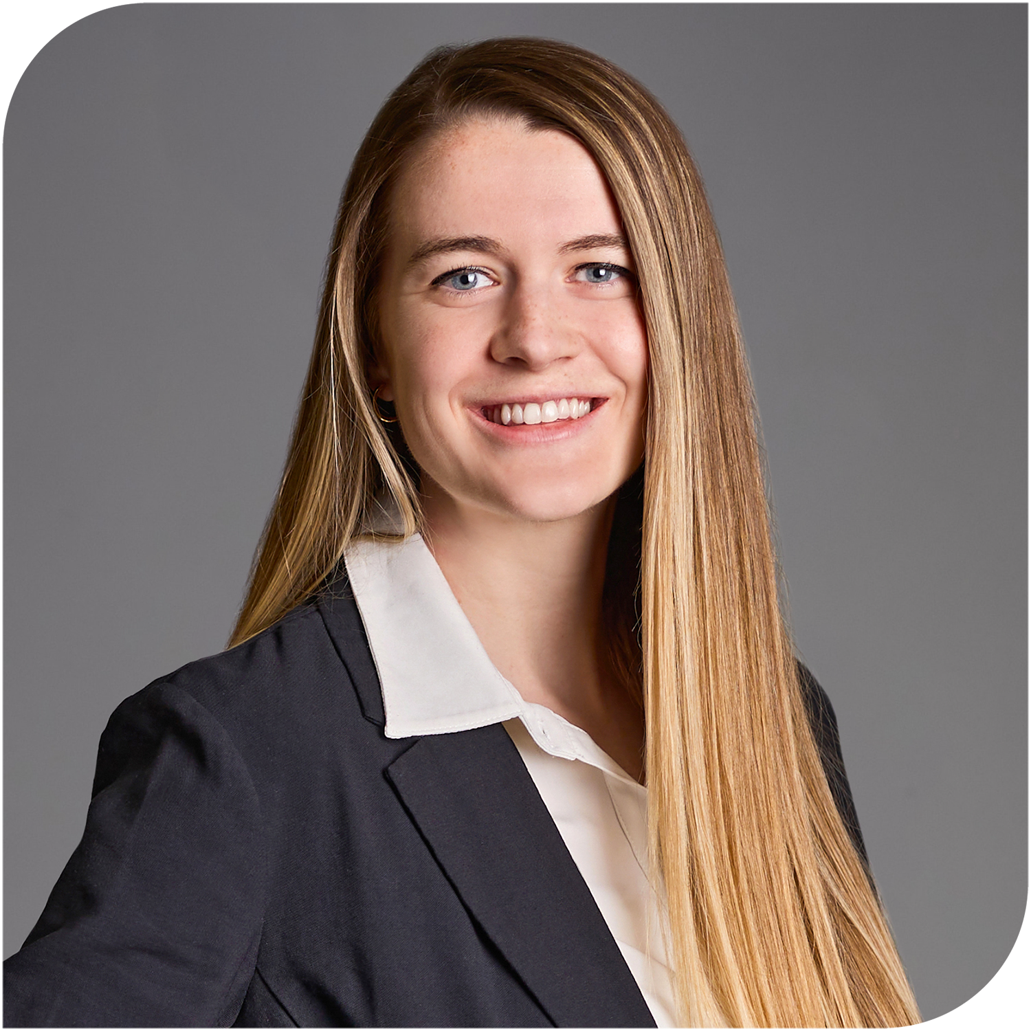 McKayla Celis, Fraser Stryker Summer Associate, wearing a black jacket and a ivory button down shirt