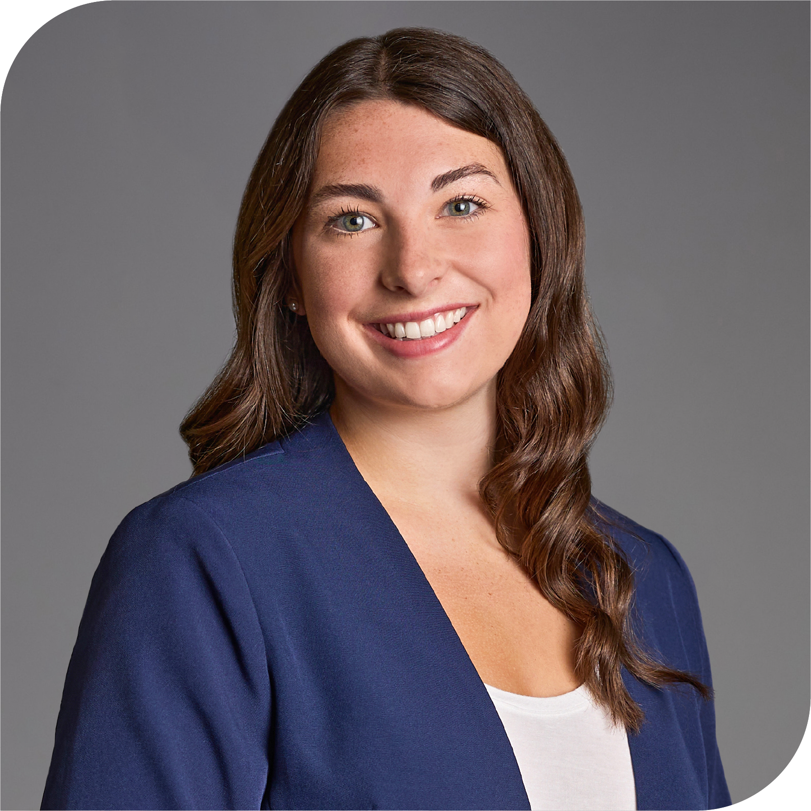 Soffi Olson, Fraser Stryker Summer Associate, wearing a blue jacket and a white shirt