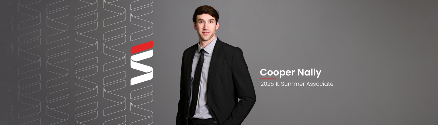 Cooper Nally, Fraser Stryker 2025 1L Summer Associate, wearing a black jacket and pants, a grey button down shirt, and black tie. Fraser Stryker logo pattern on the left side.