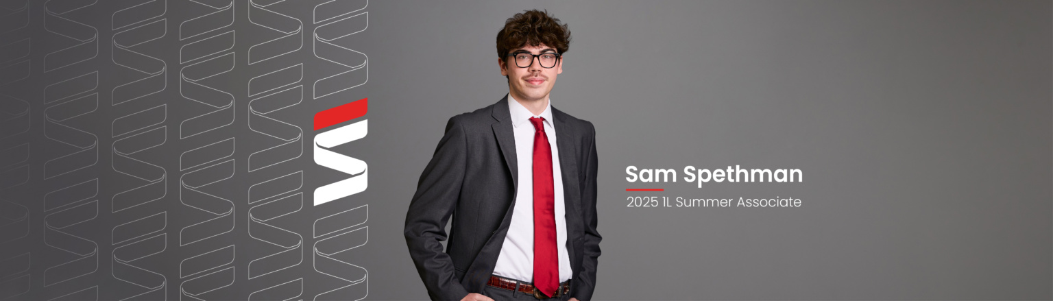 Sam Spethman, Fraser Stryker 2025 1L Summer Associate, wearing a grey jacket and pants, a white button down shirt, and red tie. Fraser Stryker logo pattern on the left side.