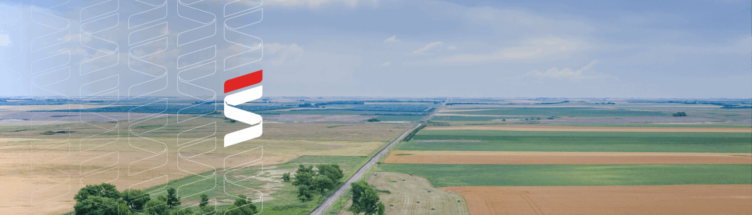 Agriculture landscape. Fraser Stryker logo icons repeating on the left side of the photo.