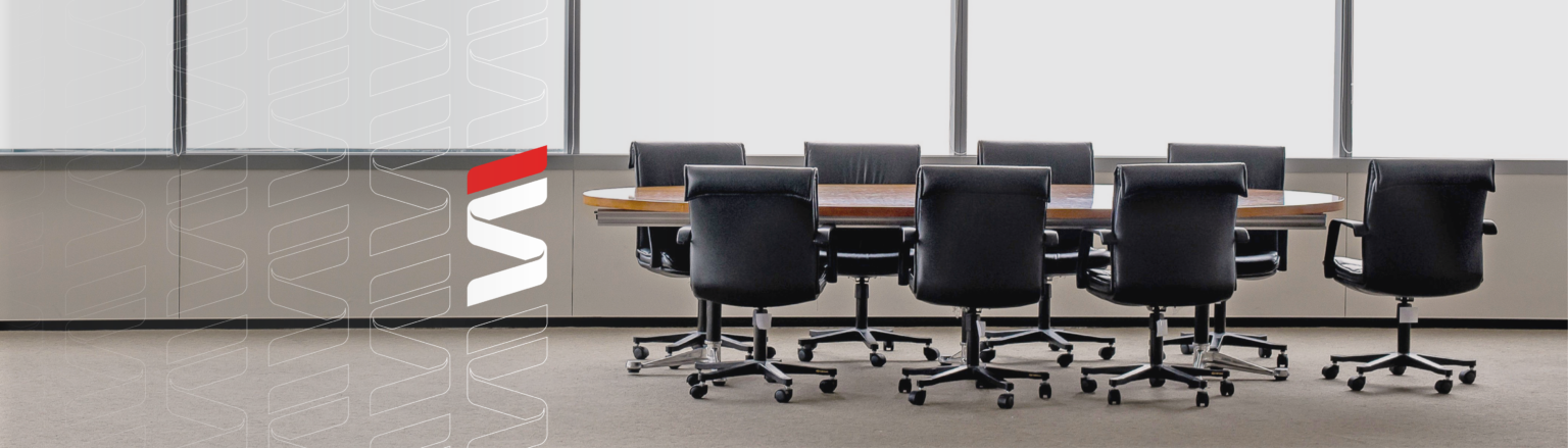 Photo of conference room with multiple chairs. Fraser Stryker logo icon repeating on the left side of the photo.