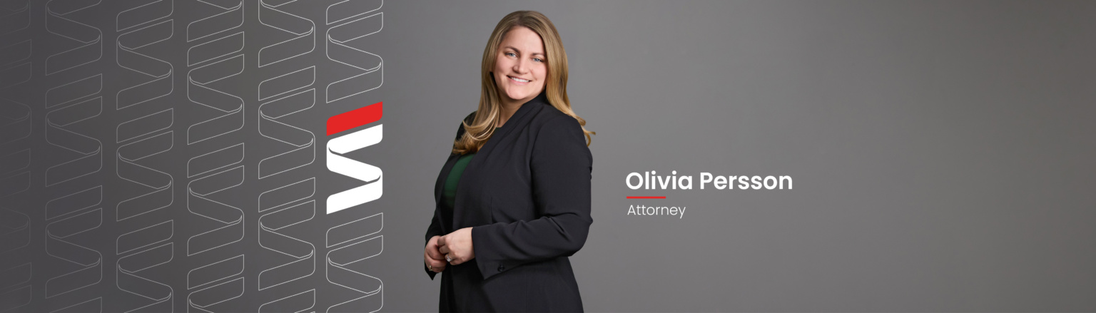 Olivia Persson, Fraser Stryker attorney, wearing a black suit jacket, black pants, and green shirt. Fraser Stryker logo icon repeating on the left side of the photo.