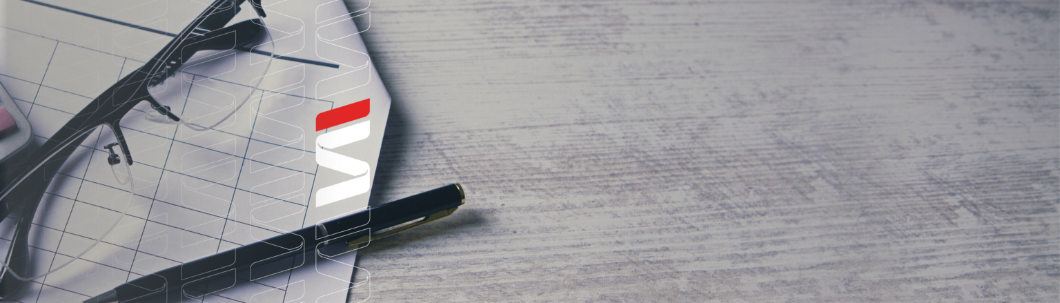 Paper form on desk with black frame glasses and black pen laying on top of it. Fraser Stryker logo icons repeating on the left side of the photo.